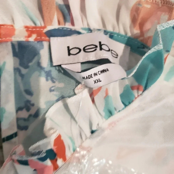 NWT Bebe Printed Smocked  Tiered Mini Dress,Tropical Garden,Green/White/Orange. - Picture 4 of 11